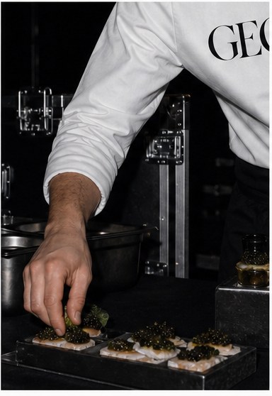 Canapés being finished at the pass